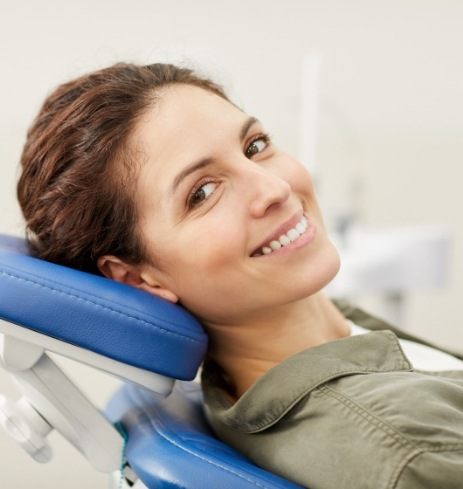 Woman relaxing during oral surgery consultation