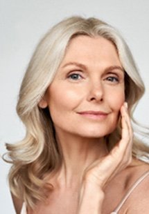 Smiling woman looking youthful after BOTOX treatment