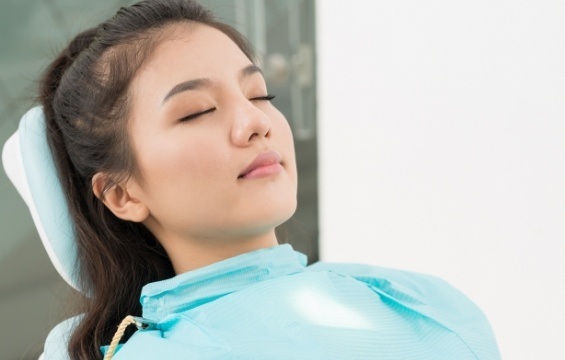 Woman relaxing underal oral conscious dental sedation