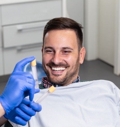 Oral surgeon talking to patient about platelet rich plasma treatment