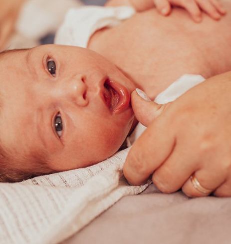 Cute baby has tongue-tie