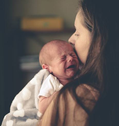 Baby cries in distress